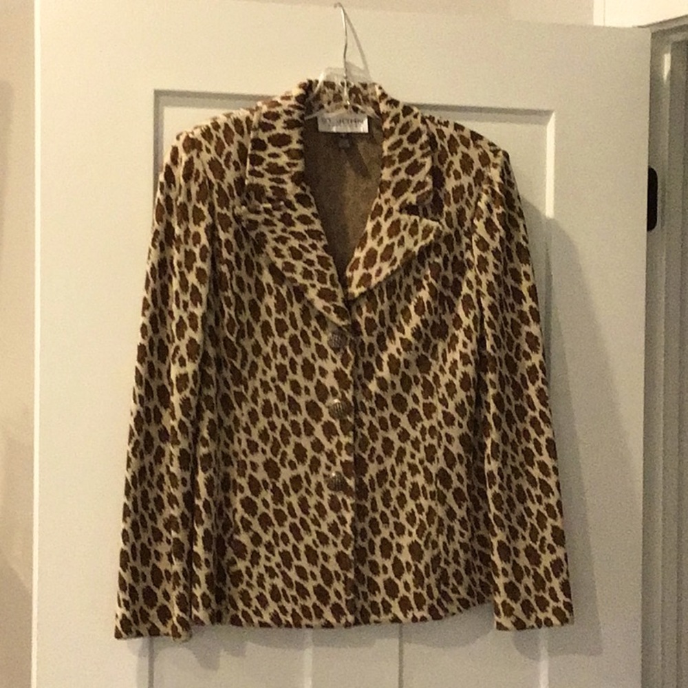 St. John Collection Knit animal print suit.  No tags. Suit has never been worn.